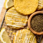 Aerial photo of lemon pepper slice and bake cookies on a cooling rack.