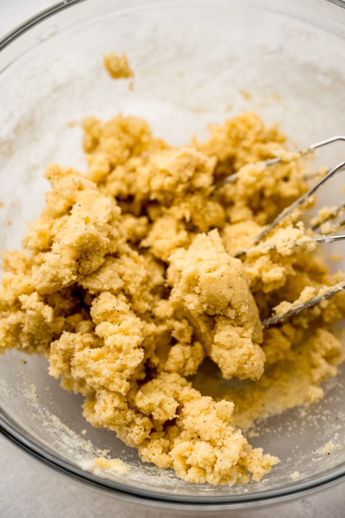 Lemon pepper slice and bake cookie dough in a bowl.