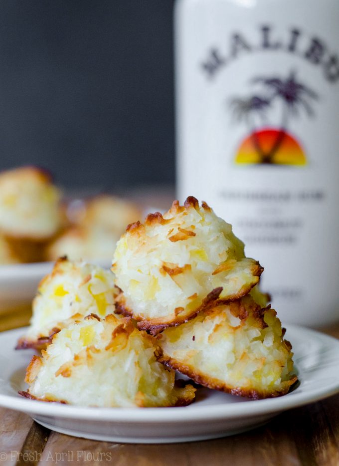 Piña Colada Macaroons: Easy coconut macaroons filled with crushed pineapple and spiked with a touch of coconut rum.