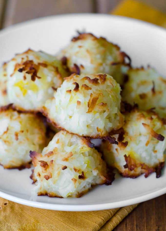 Piña Colada Macaroons: Easy coconut macaroons filled with crushed pineapple and spiked with a touch of coconut rum.