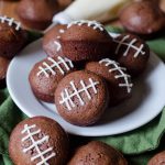 Game Day Brownie Bites: Adorable bite-size brownies adorned with buttercream football stripes. Perfect for any football game day you're looking to celebrate!