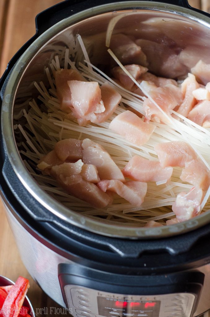 Instant Pot Chicken & Vegetable Stir Fry: A quick and easy version of "stir fry," no pan or stovetop required! Sticky and dense noodles, tender chicken, and crunchy vegetables, ready in about 20 minutes!