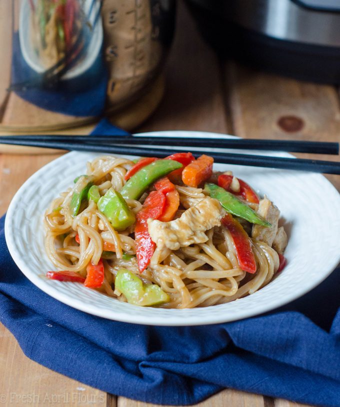 Instant Pot Chicken & Vegetable Stir Fry: A quick and easy version of "stir fry," no pan or stovetop required! Sticky and dense noodles, tender chicken, and crunchy vegetables, ready in about 20 minutes!