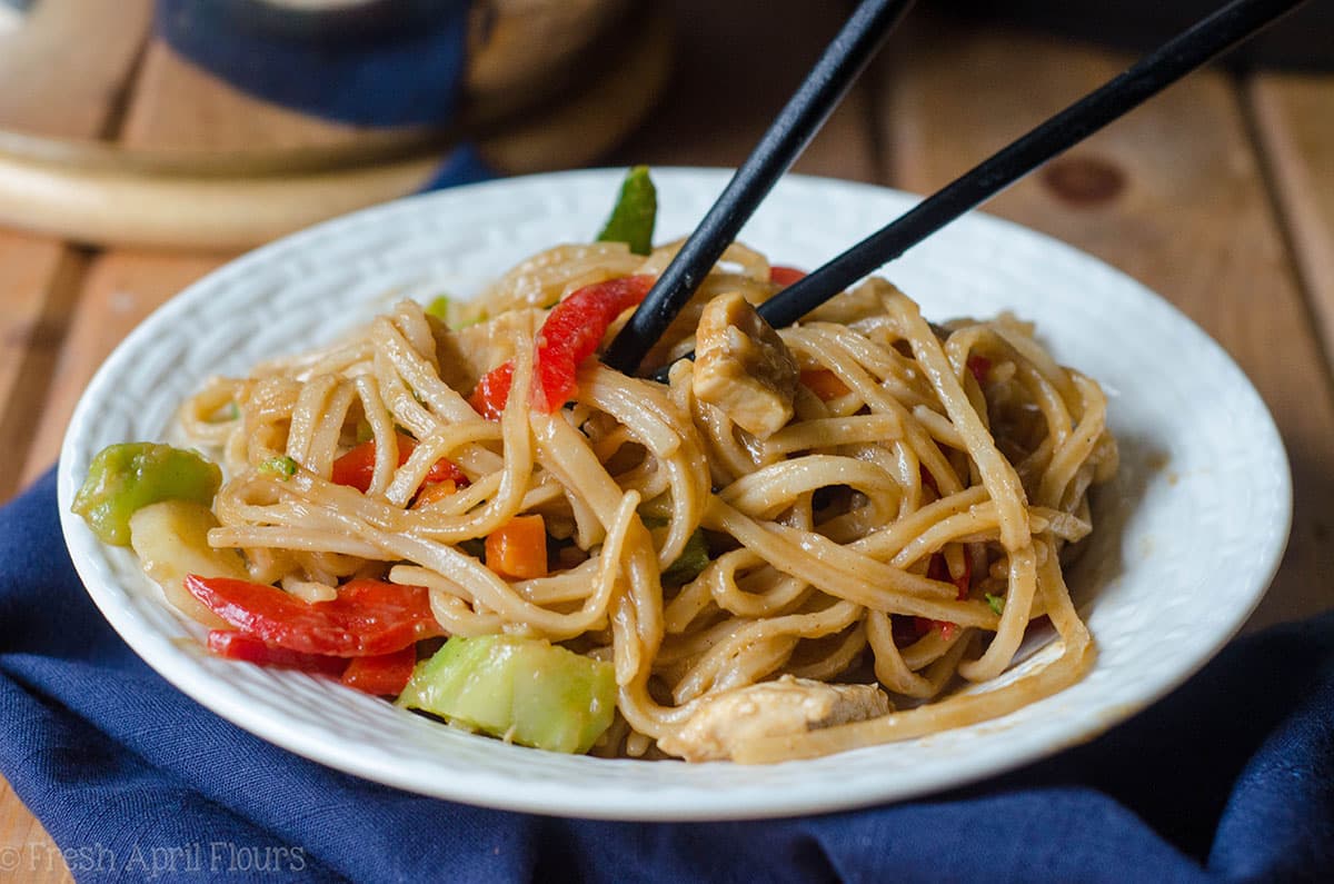 Instant Pot Chicken & Vegetable Stir Fry: A quick and easy version of "stir fry," no pan or stovetop required! Sticky and dense noodles, tender chicken, and crunchy vegetables, ready in about 20 minutes!