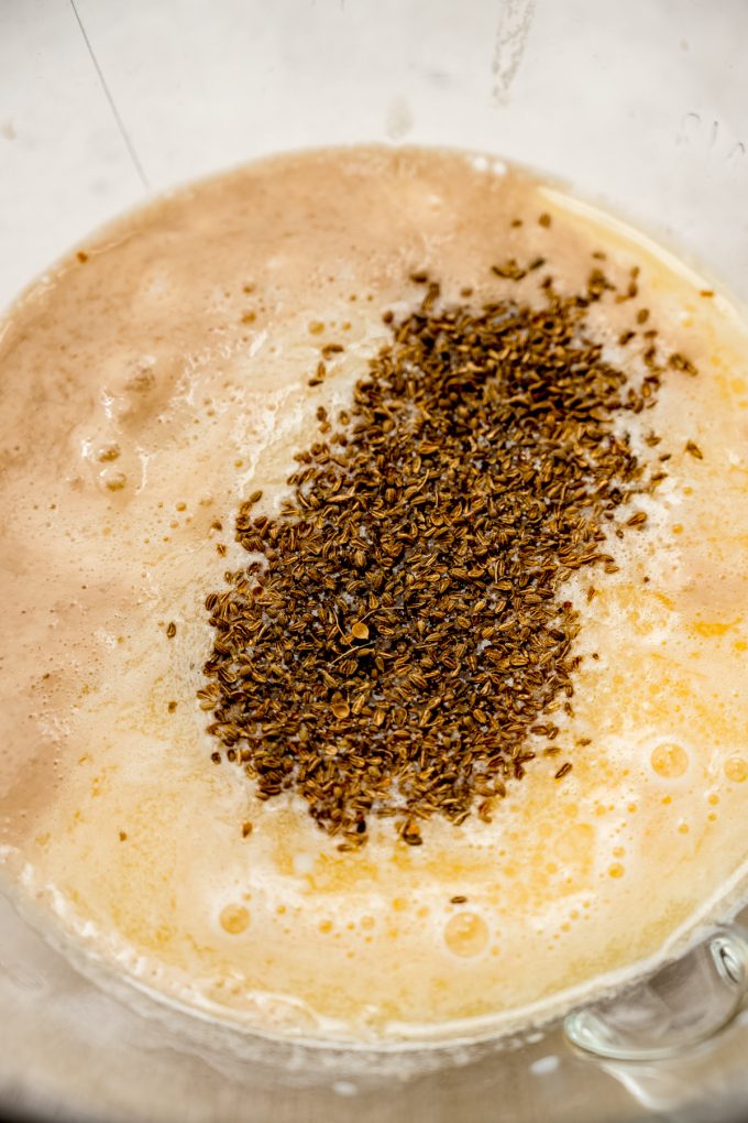 The wet ingredients for anise bread in a bowl.