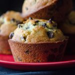 Bakery Style Chocolate Chip Muffins: Jumbo size buttery muffins stuffed with enough chocolate chips to rival your favorite bakery!