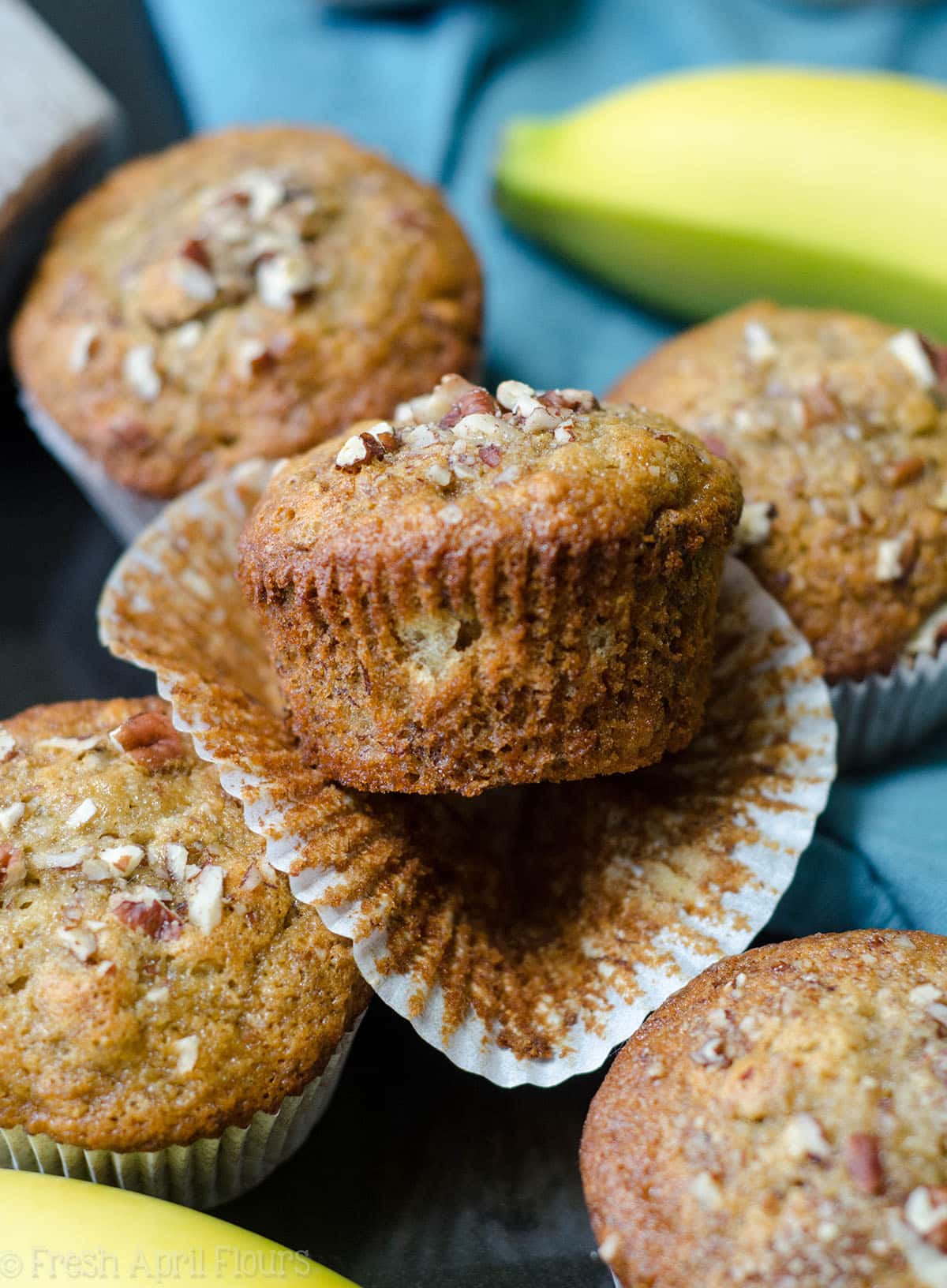 banana bread muffin with a bite taken out of it