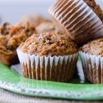 Morning Glory Muffins: Hearty whole wheat muffins packed with fruits, vegetables, nuts, and flaxseed to fill you up at breakfast time.
