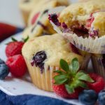 Very Berry Muffins: Soft and flavorful buttermilk muffins bursting with blueberries, raspberries, and strawberries.