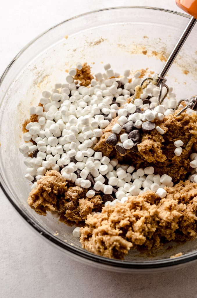 Cookie dough for s'mores chocolate chip cookies before it has been fully mixed.