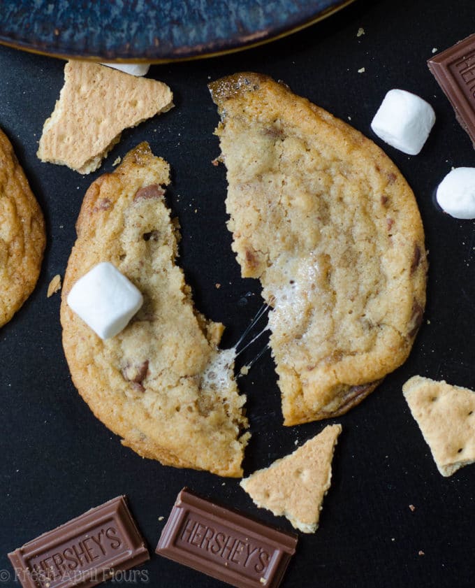 S'mores Cookies: Classic milk chocolate chip cookies scattered with gooey marshmallows and crunchy graham cracker crumbs.