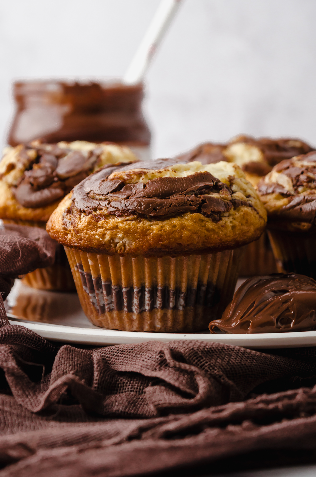 A Nutella muffin on a plate.