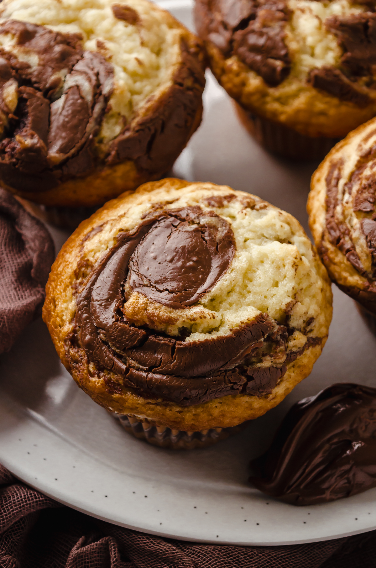 A Nutella muffin on a plate.