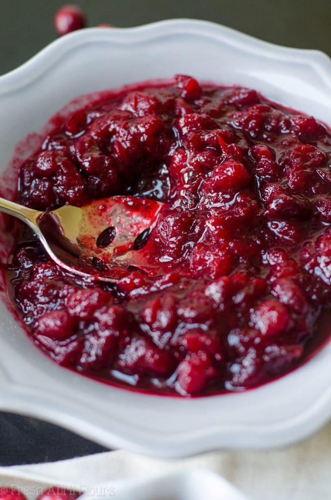 Homemade Spiced Cranberry Sauce: Traditional cranberry sauce gets a spicy makeover to keep Thanksgiving interesting! Spiced with cinnamon and cloves, this cranberry sauce will add a little flair to your holiday spread.
