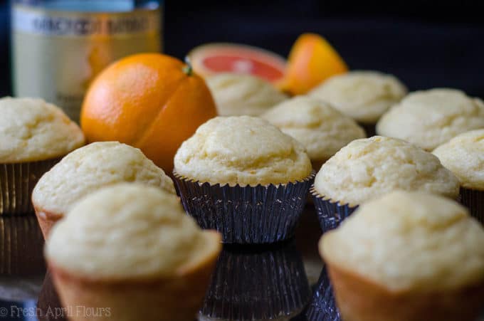 Glazed Mimosa Muffins: Tender citrus muffins made with a champagne reduction and topped with a boozy orange glaze are the sweetest way to get your mimosa fix.
