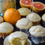 Glazed Mimosa Muffins: Tender citrus muffins made with a champagne reduction and topped with a boozy orange glaze are the sweetest way to get your mimosa fix.