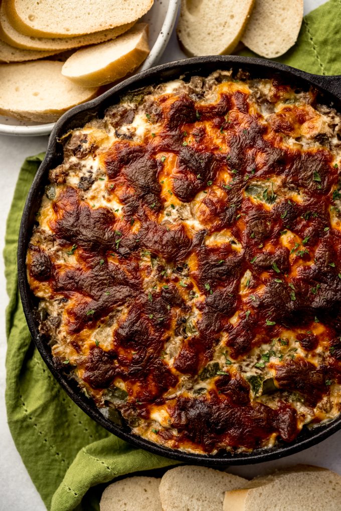 Aerial photo of Philly cheesesteak dip in a skillet.