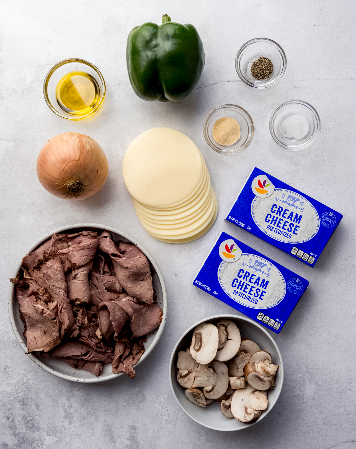 Aerial photo of the ingredients to make Philly cheesesteak dip.