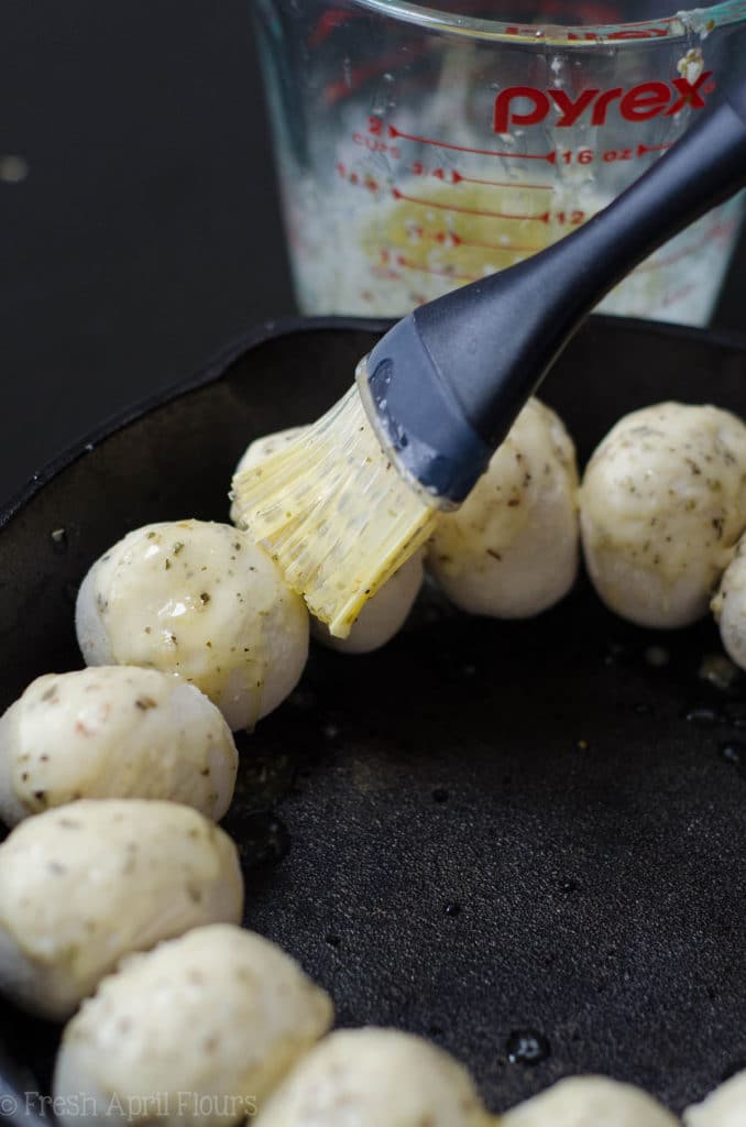 Skillet Pizza Dip: Ditch the delivery and prepare your pizza in a skillet with built-in bread! Also includes directions for omitting the rolls.