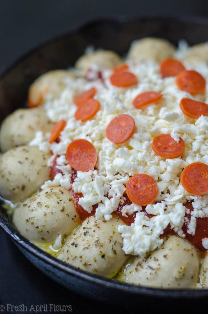 Skillet Pizza Dip: Ditch the delivery and prepare your pizza in a skillet with built-in bread! Also includes directions for omitting the rolls.