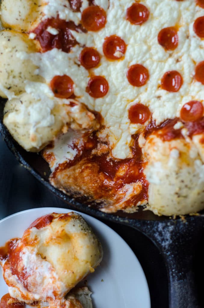 Skillet Pizza Dip: Ditch the delivery and prepare your pizza in a skillet with built-in bread! Also includes directions for omitting the rolls.