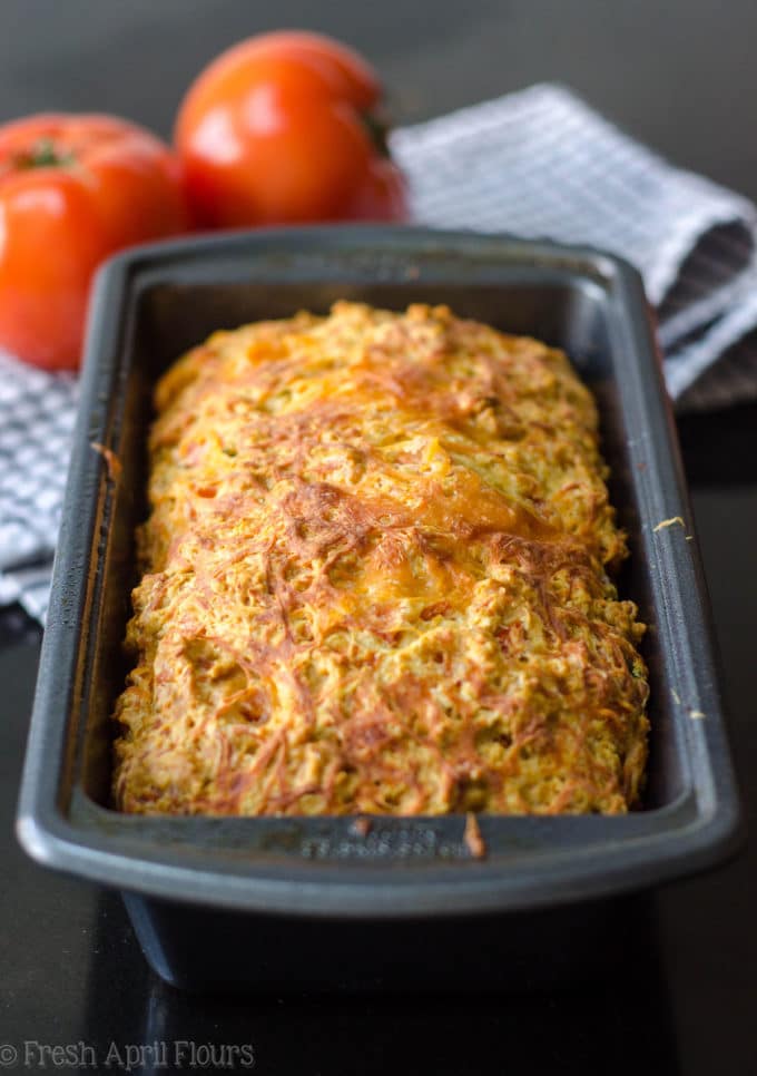 Herbed Tomato Quick Bread: A savory bread that comes together quickly using fresh tomatoes and basil. Perfect for using summer produce!