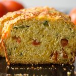 Herbed Tomato Quick Bread: A savory bread that comes together quickly using fresh tomatoes and basil. Perfect for using summer produce!
