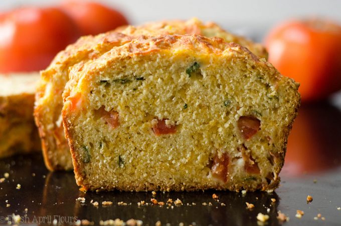 Herbed Tomato Quick Bread: A savory bread that comes together quickly using fresh tomatoes and basil. Perfect for using summer produce!