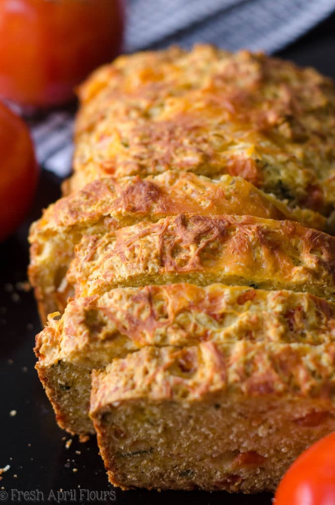 Herbed Tomato Quick Bread: A savory bread that comes together quickly using fresh tomatoes and basil. Perfect for using summer produce!