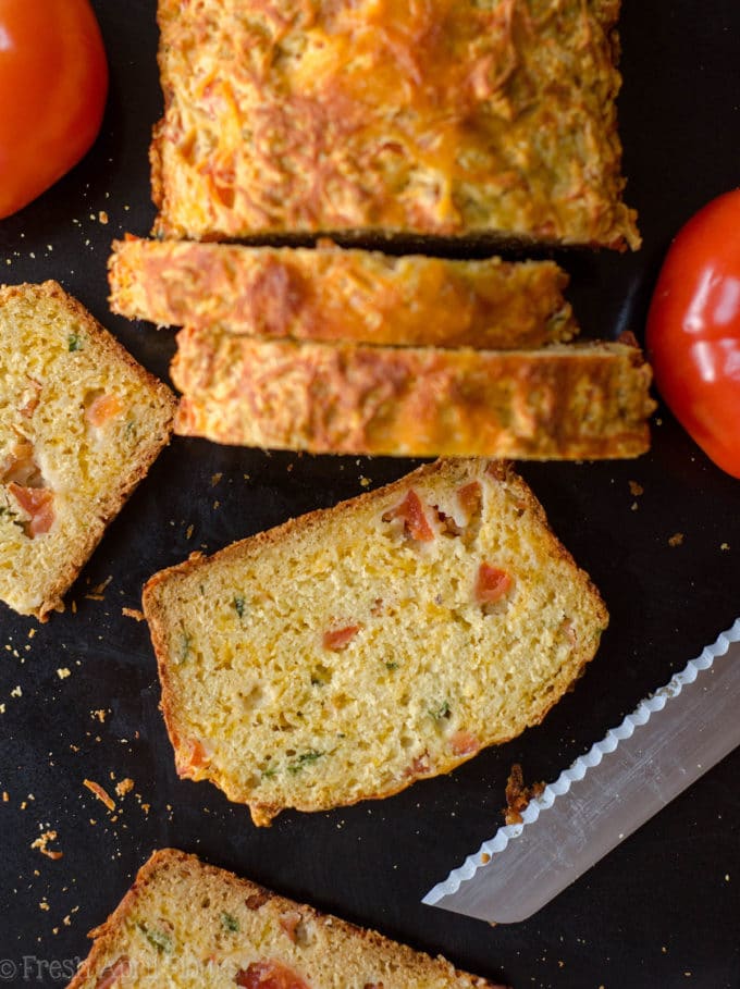 Herbed Tomato Quick Bread: A savory bread that comes together quickly using fresh tomatoes and basil. Perfect for using summer produce!