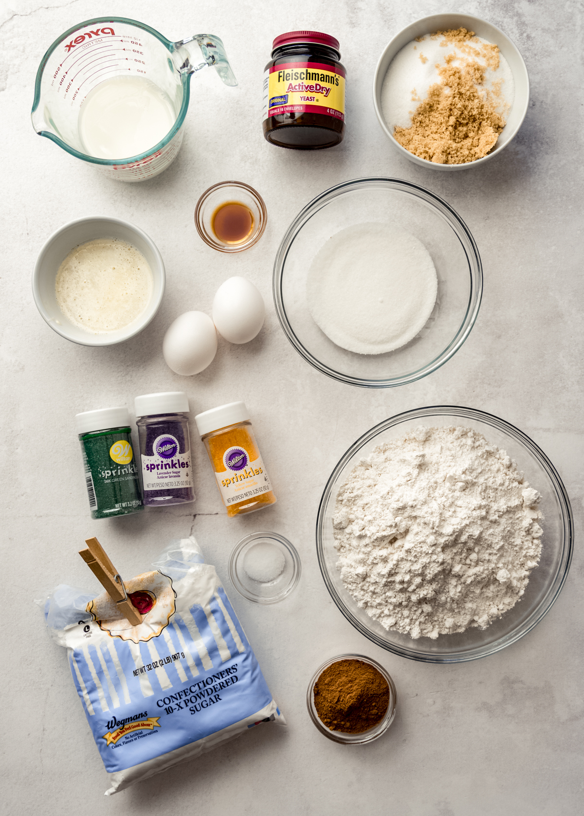 Aerial photo of ingredients to make a Mardi Gras king cake.