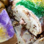 Mardi Gras King Cake: A simple spiced yeast dough is filled with a cinnamon sugar filling, twisted into a ring, and adorned with colored sugar.