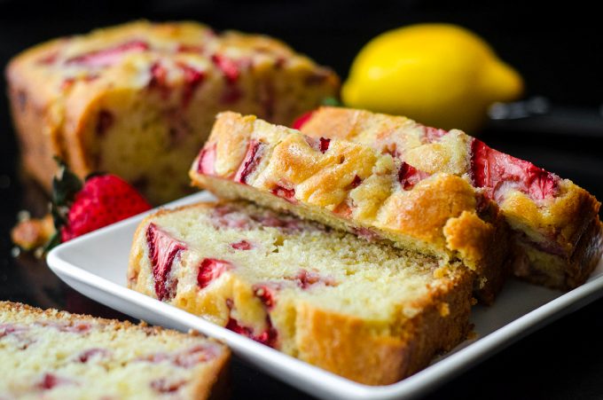 slices of strawberry lemonade quick bread on a white plate