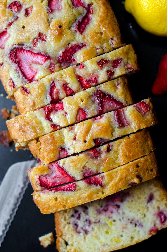 aerial photo of strawberry lemonade quick bread cut into slices