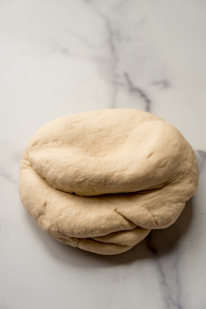 Yeast bread dough on a surface.