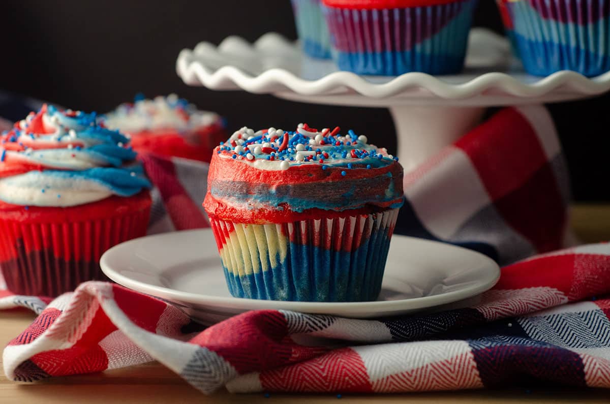 Red, White, & Blue Swirl Cupcakes: Beautifully swirled cupcakes that taste as great as they look! Perfect for any patriotic celebration or any time you want some American pride in your dessert.