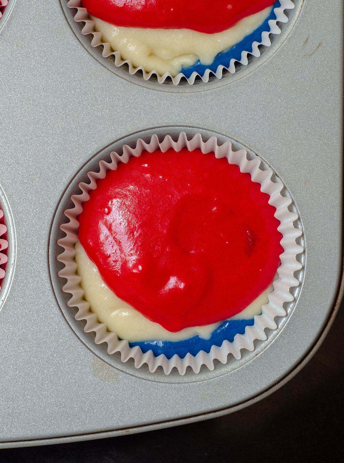 Red, White, & Blue Swirl Cupcakes: Beautifully swirled cupcakes that taste as great as they look! Perfect for any patriotic celebration or any time you want some American pride in your dessert.