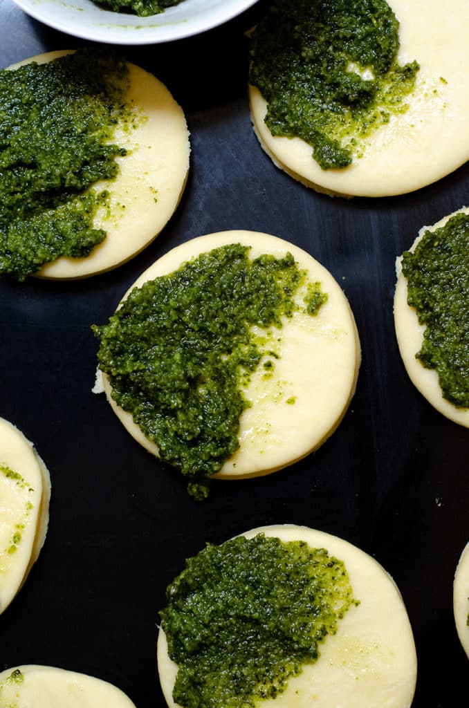 Pull-Apart Pesto Bread: Soft and fluffy pull-apart bread filled with zesty, herbed pesto.