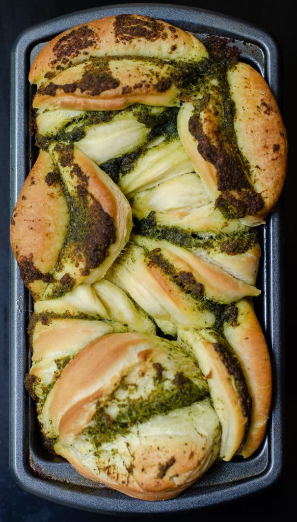 Pull-Apart Pesto Bread: Soft and fluffy pull-apart bread filled with zesty, herbed pesto.