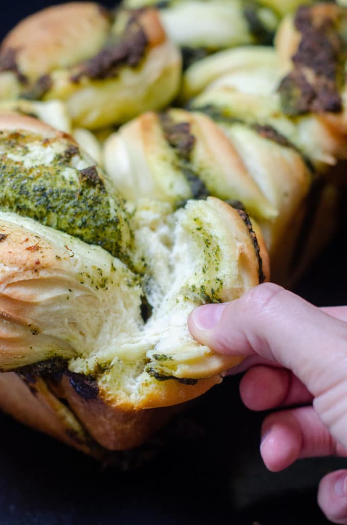 Pull-Apart Pesto Bread: Soft and fluffy pull-apart bread filled with zesty, herbed pesto.