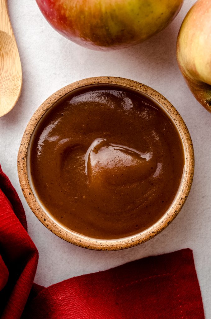 Aerial photo of apple butter in a small bowl.