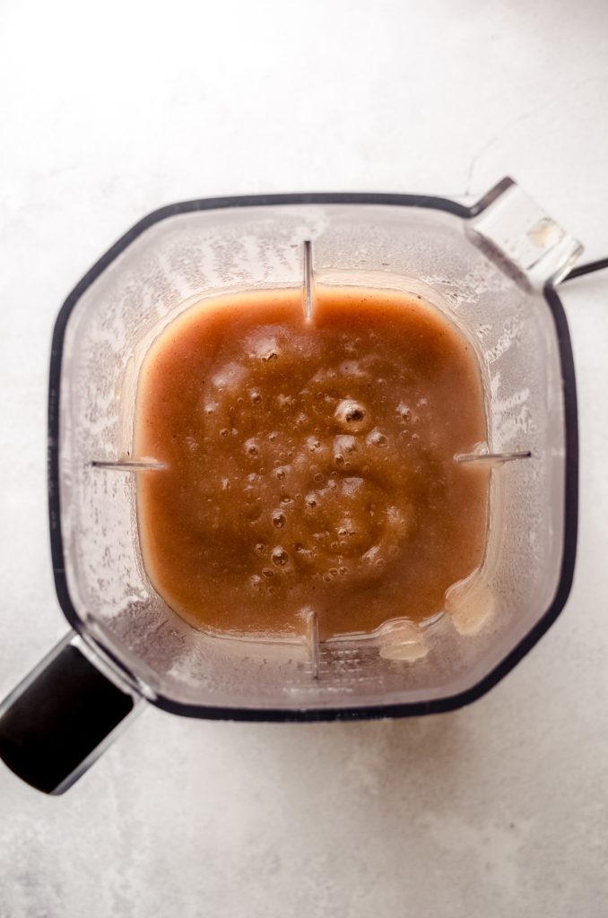 Aerial photo of cooked apple mixture to make apple butter in a blender.