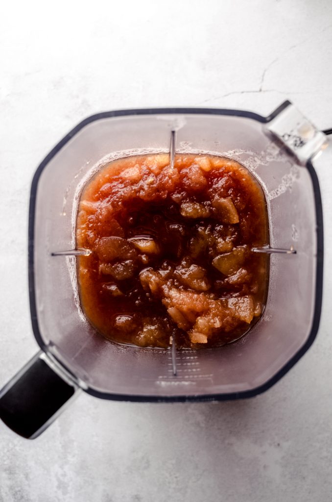 Aerial photo of cooked apple mixture to make apple butter in a blender.