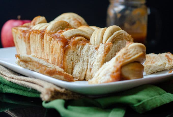 Apple Butter Pull-Apart Bread: Soft and fluffy pull-apart bread spiced with cinnamon and spread with homemade apple butter.