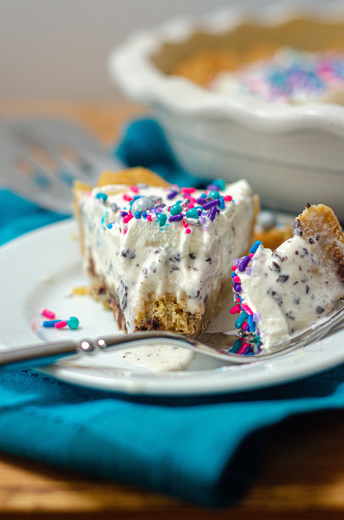 Creamy chocolate chip cookie dough ice cream is the filling for this frozen pie and sits atop a buttery chocolate chip cookie crust. via @frshaprilflours