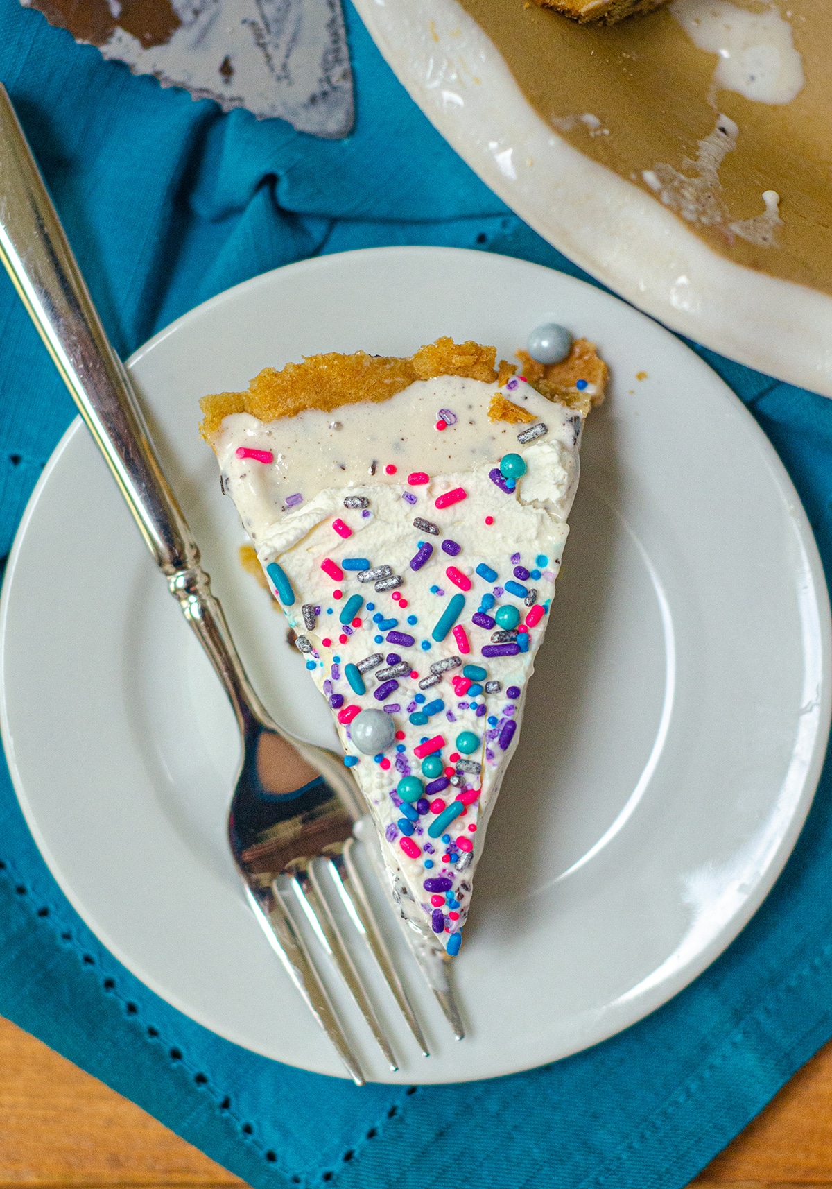 Creamy chocolate chip cookie dough ice cream is the filling for this frozen pie and sits atop a buttery chocolate chip cookie crust. via @frshaprilflours