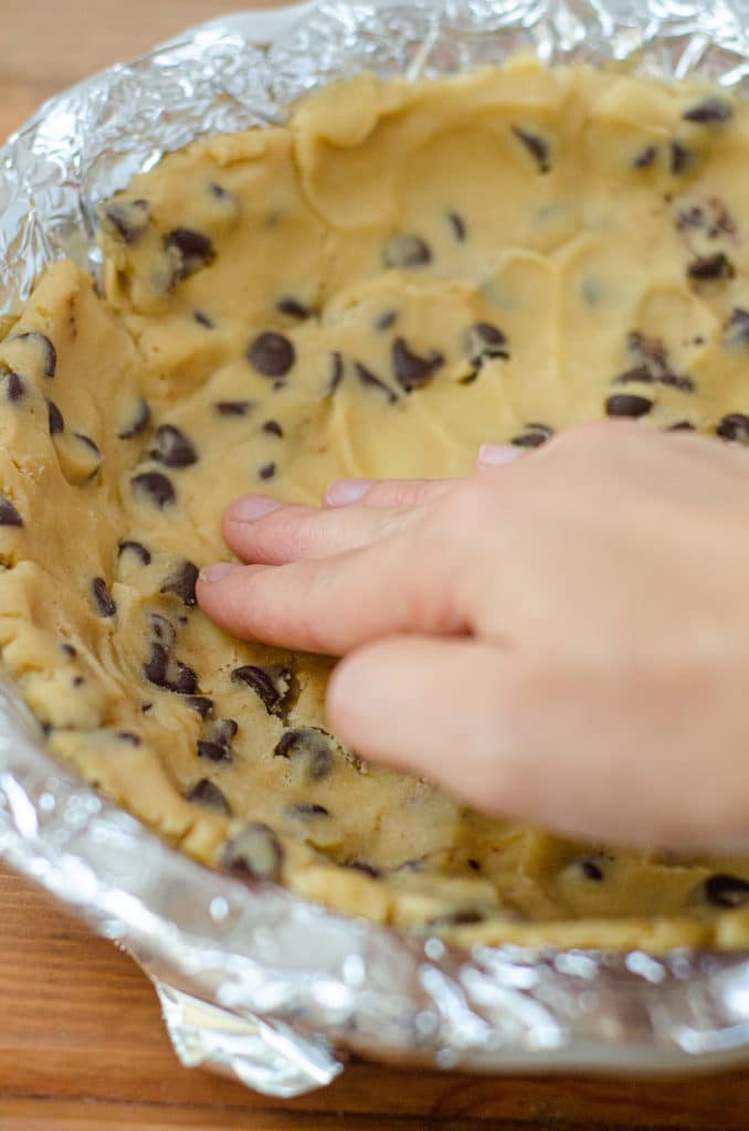 Chocolate Chip Cookie Dough Ice Cream Pie: Creamy chocolate chip cookie dough ice cream is the filling for this frozen pie and sits atop a buttery chocolate chip cookie crust.