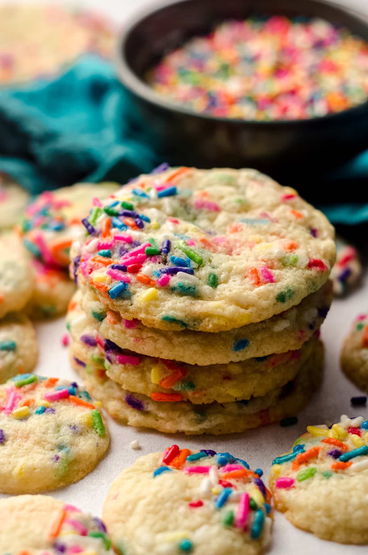 stack of sugar cookies with sprinkles
