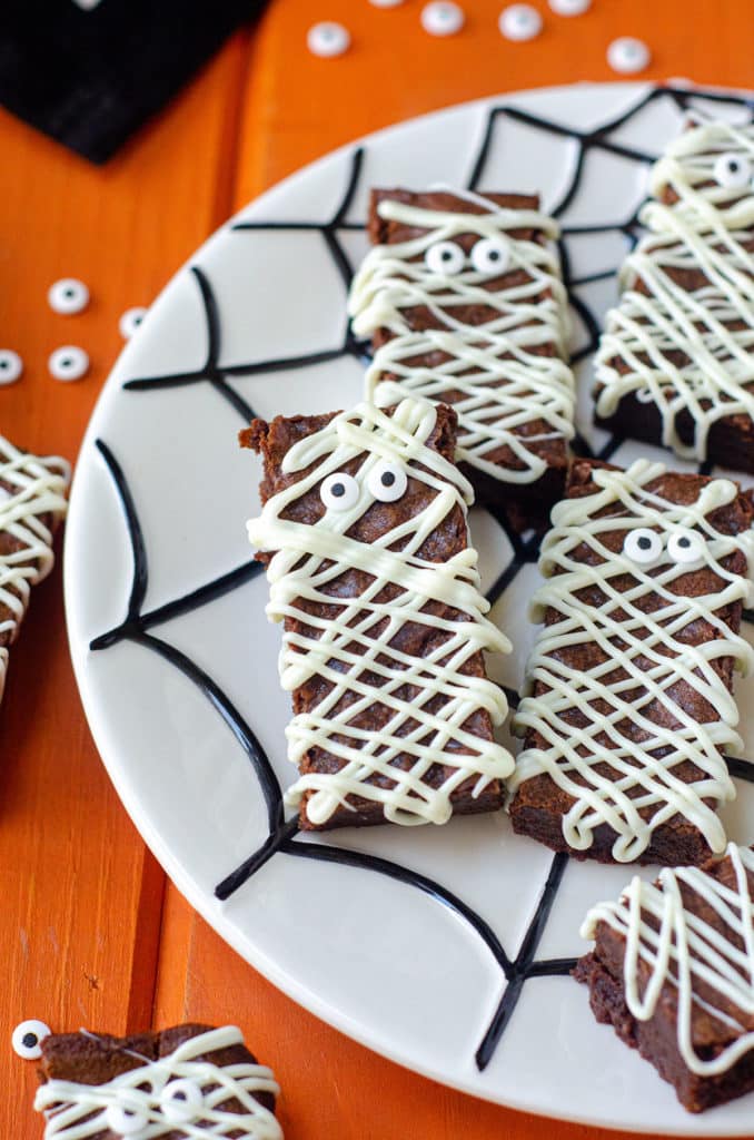 mummy brownies on a spider web plate