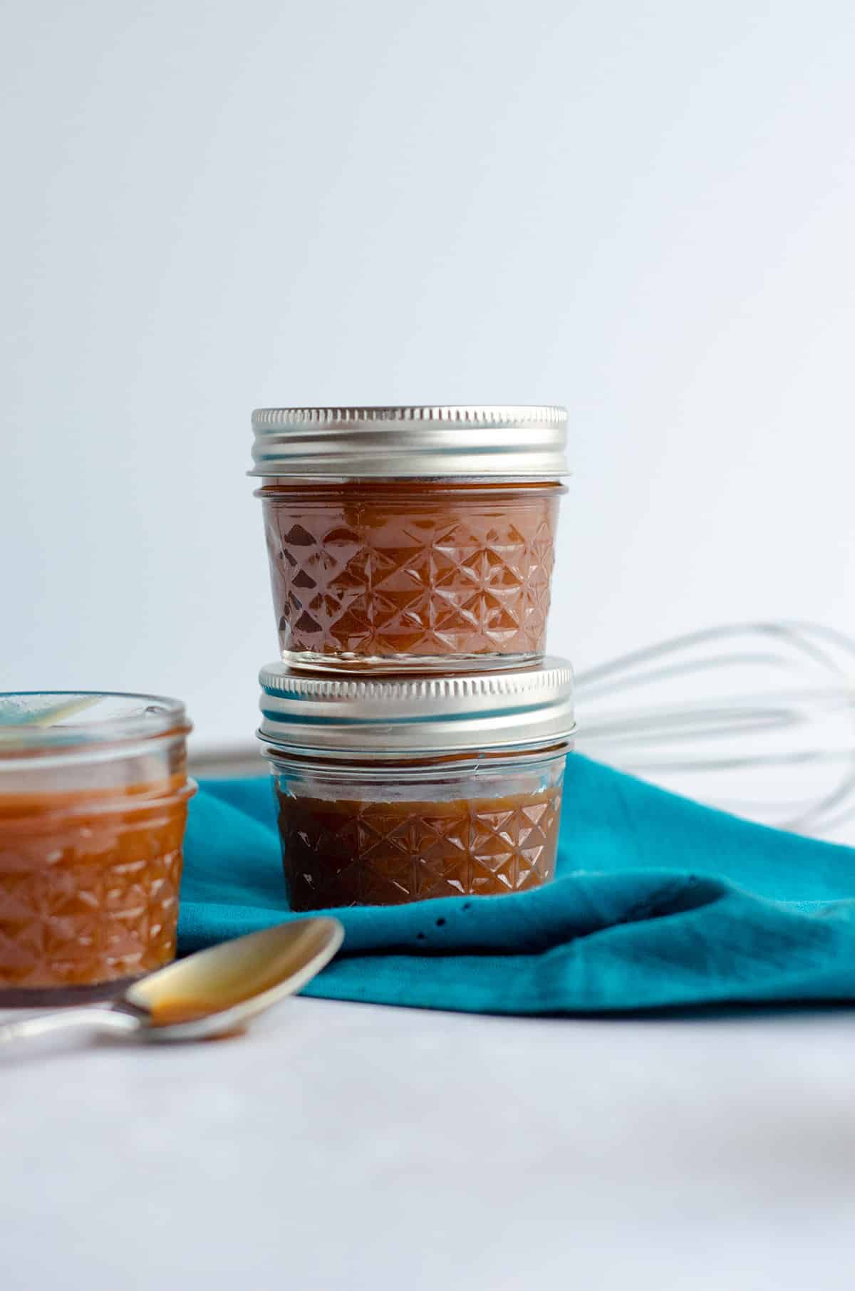 jarred salted caramel sauce ready to give as a homemade gift